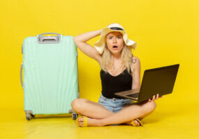 front-view-young-female-holding-her-laptop