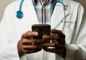 telehealth doctor on cell phone